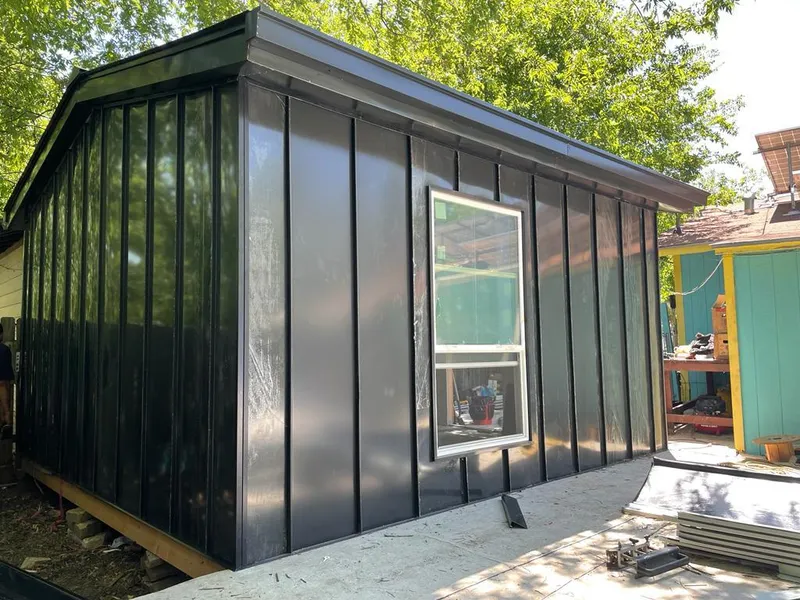 Black standing seam metal wall panels for Roof Inspection in Redlands